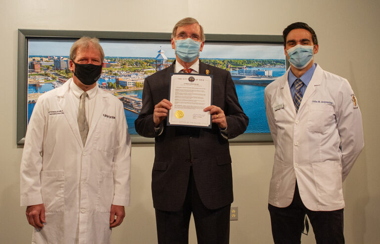 LECOM Faculty and Erie Mayor Joe Schember celebrate the National Osteopathic Medicine Week