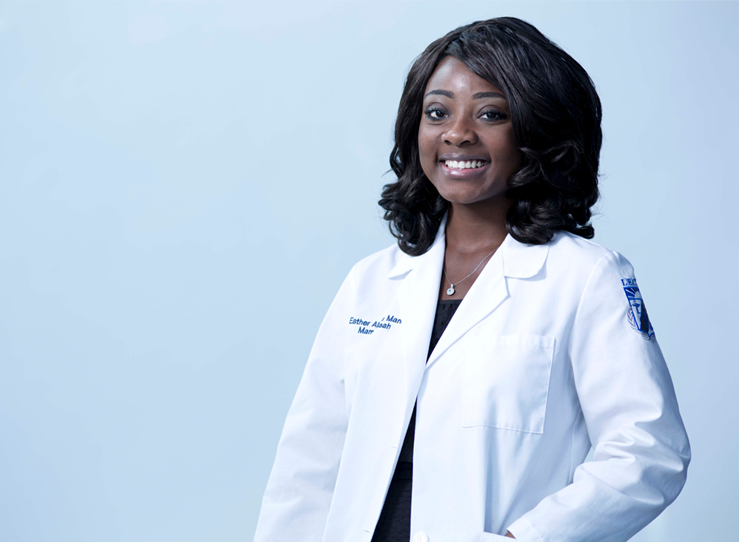 Young black female in white coat at LECOM
