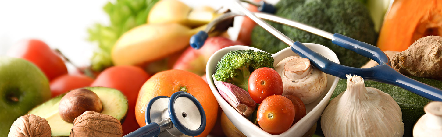 Healthy food concept with fruits and vegetables and stethoscope