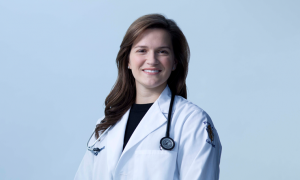 A WOMAN DOCTOR SMILING IN ERIE PA BY LECOM